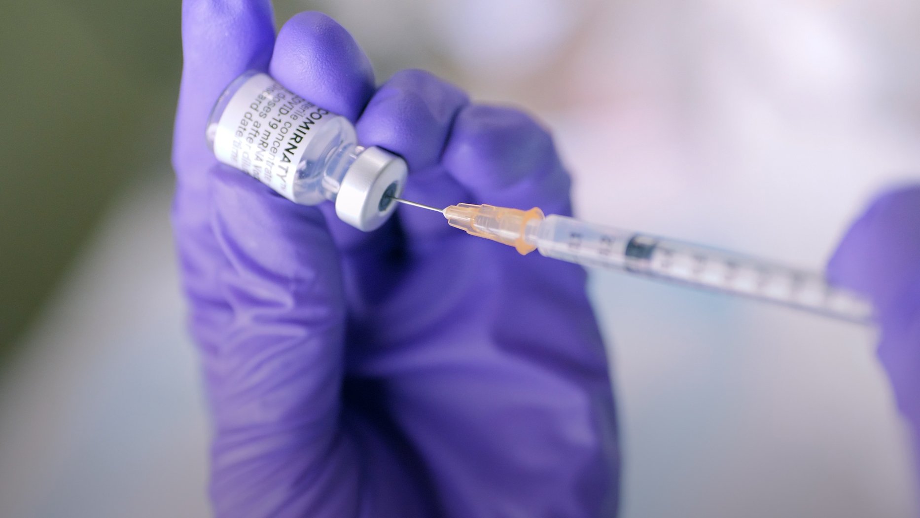 Photo: Handling the COVID-19 vaccine.