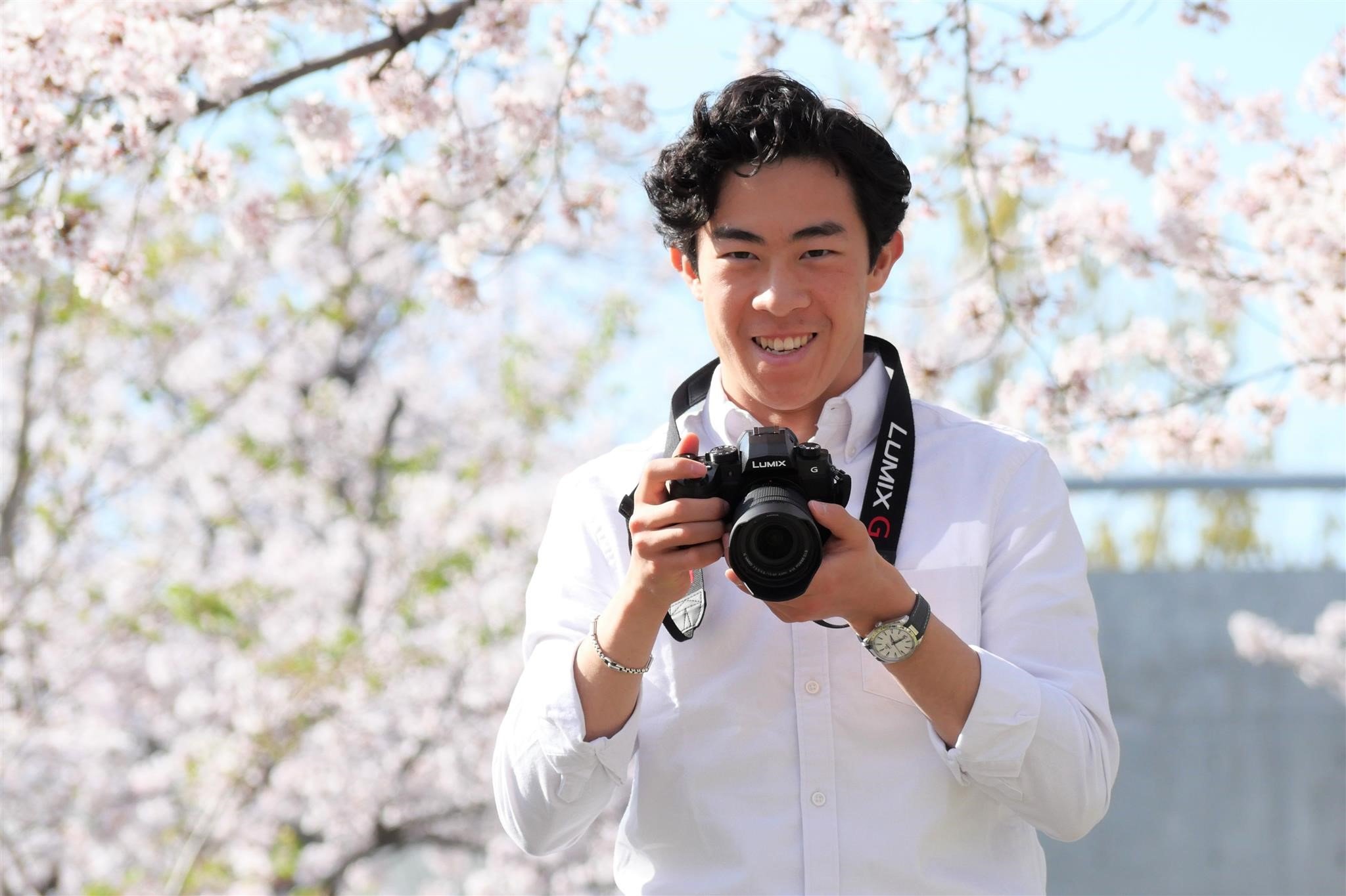 Photo: Nathan Chen holding a camera