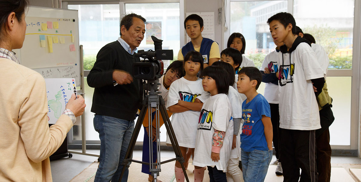 Photo: Children intently working on video production