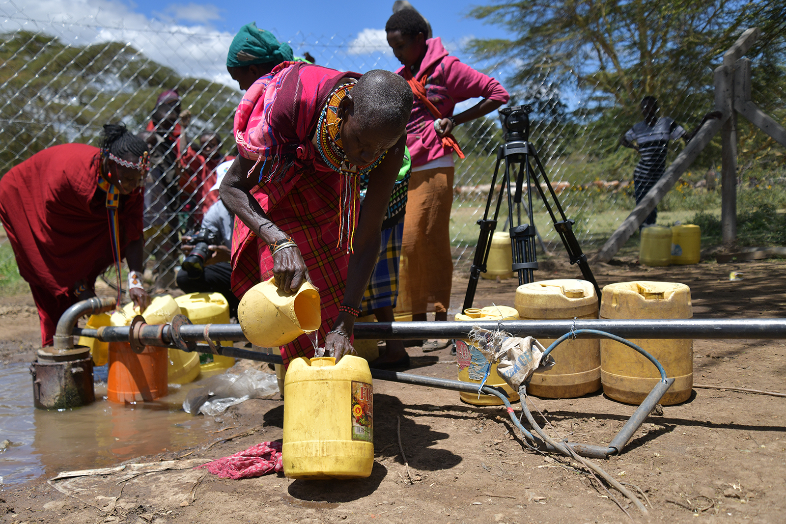Photo: Women gathering water in an area severely affected by drought