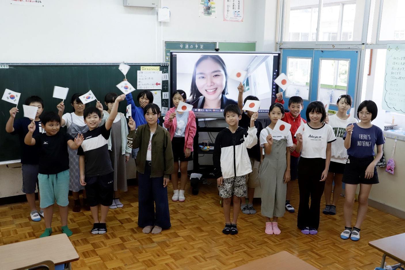 Photo: Sang Eun shares her story with elementary schoolchildren in Kumamoto, Japan