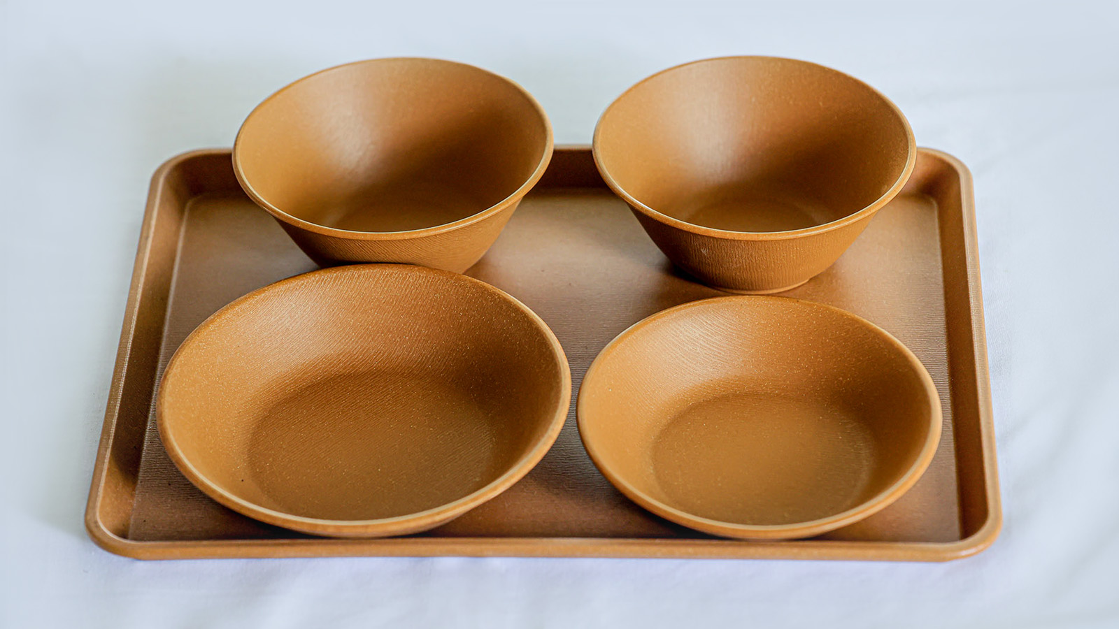 Photo: Lunchtime tableware used at a school in Fukuchiyama City, Kyoto Prefecture, made from kinari containing extracts from surplus local trees