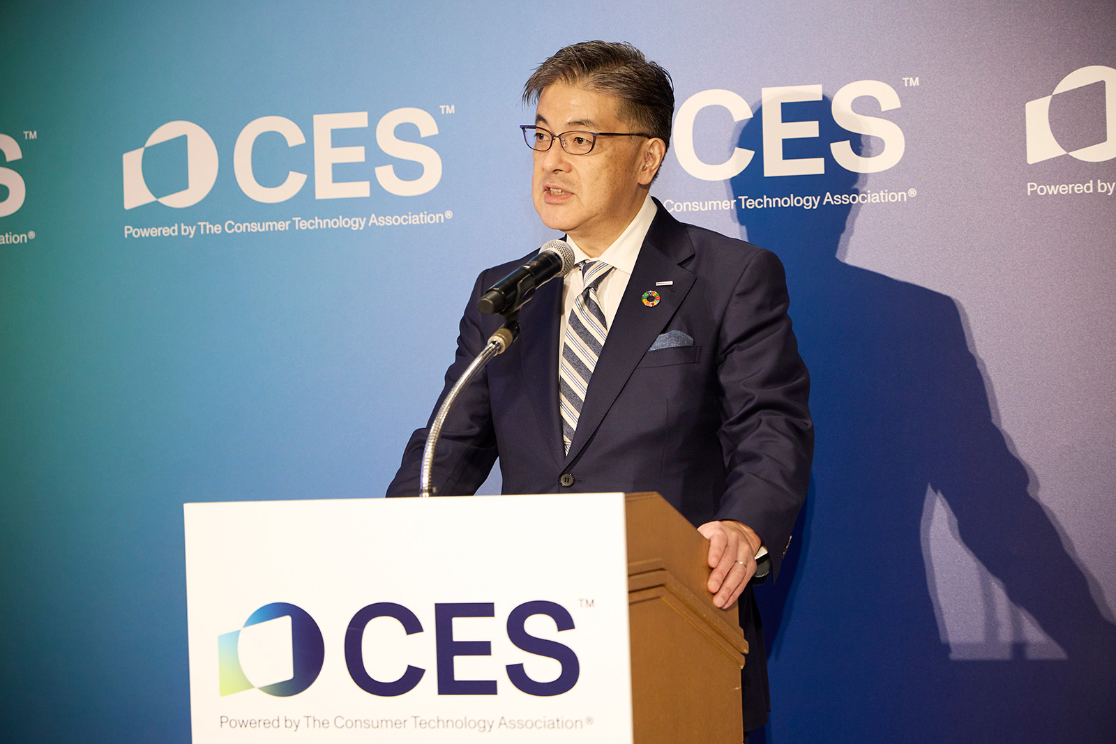 Photo: Kusumi CEO speaking at the October 1 event