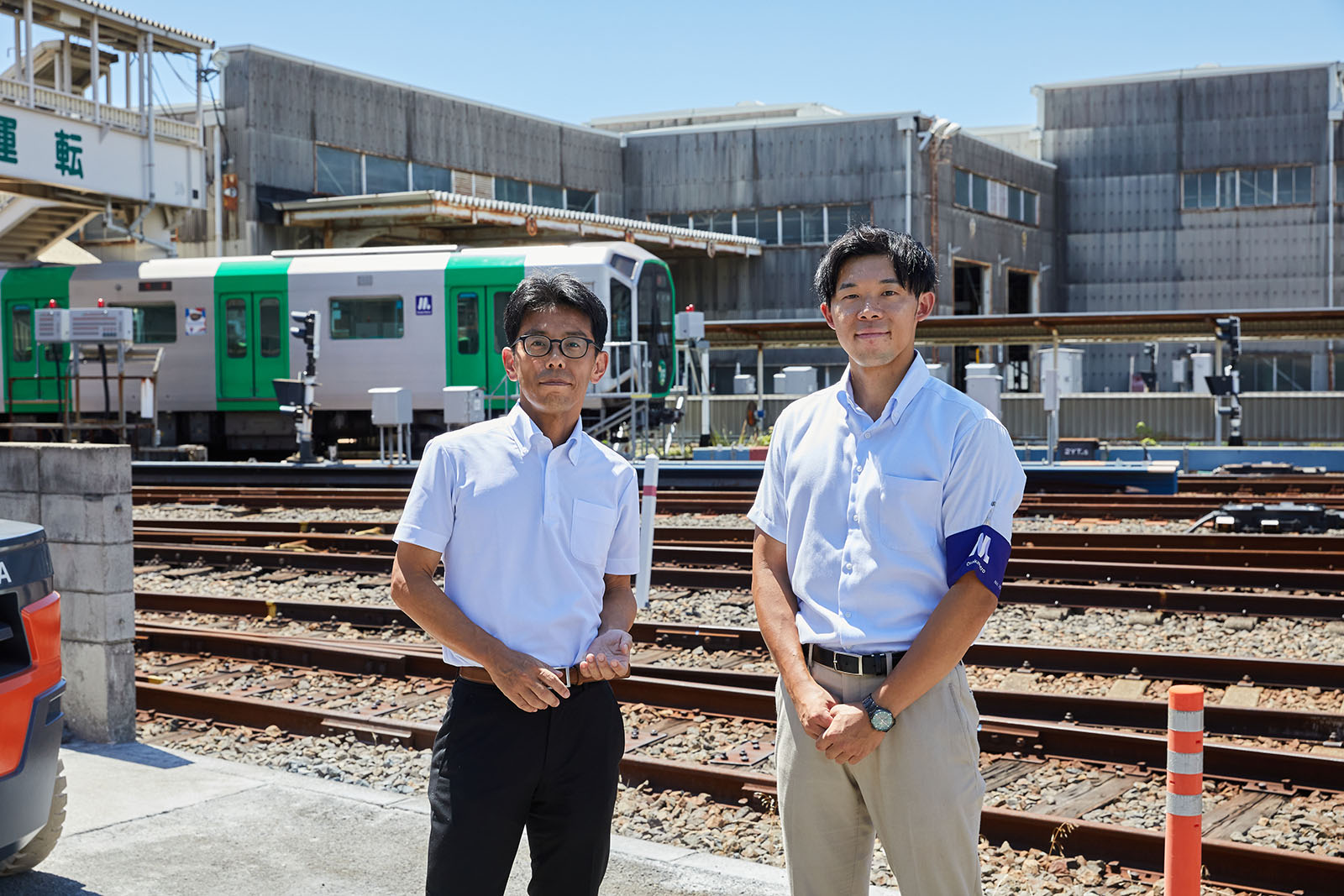 彦坂（写真左）と納塚氏（写真右）
