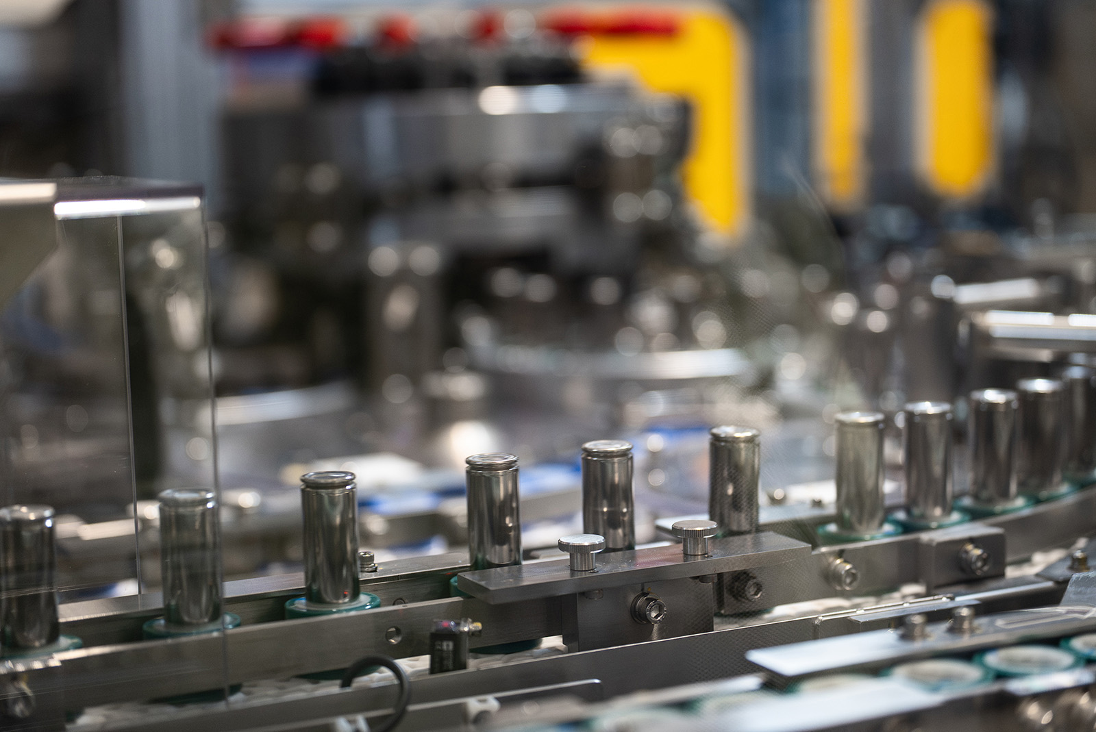 Cylindrical lithium-ion batteries being manufactured at a Panasonic factory