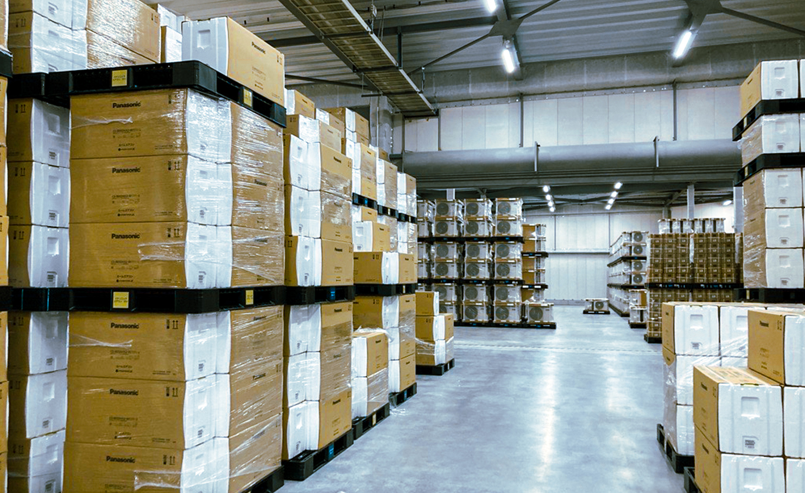 Pallets stacked in warehouse
