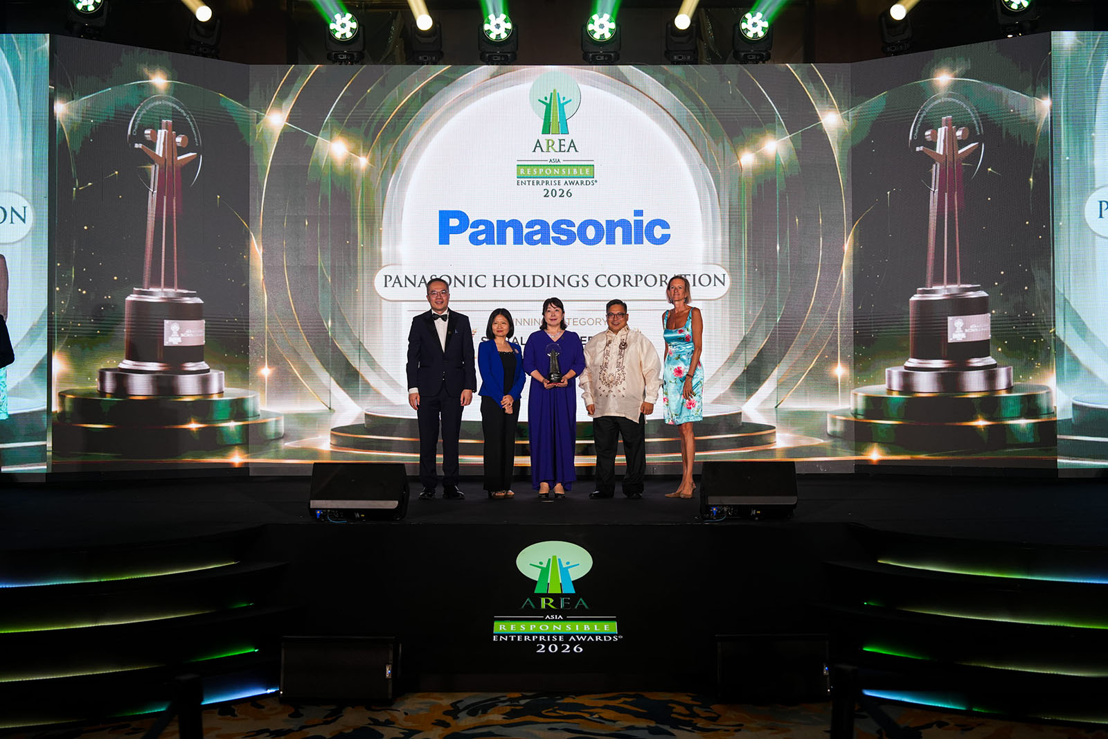 People pose on stage as Panasonic is recognized at the Asia Responsible Enterprise Awards 2026.